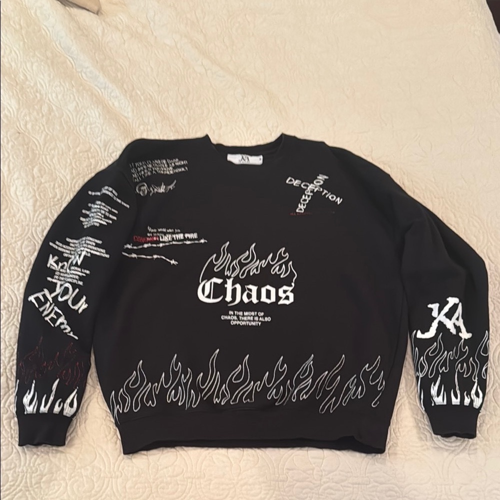 Edgy Black Crewneck Sweater with Graphic Designs
